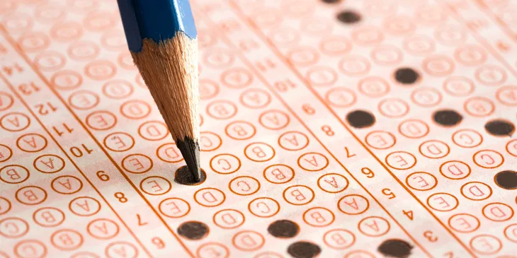 Standardized test with pencil filling answers
