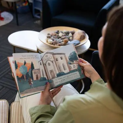 Illustrated storybook held open