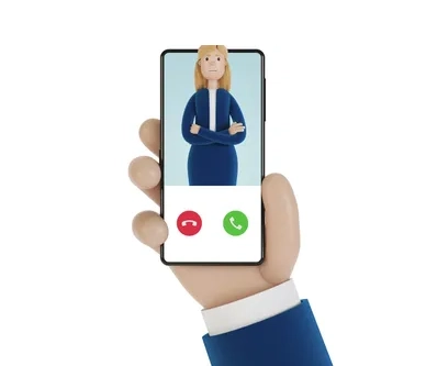 Hand holding smartphone showing an incoming video call from a businesswoman.
