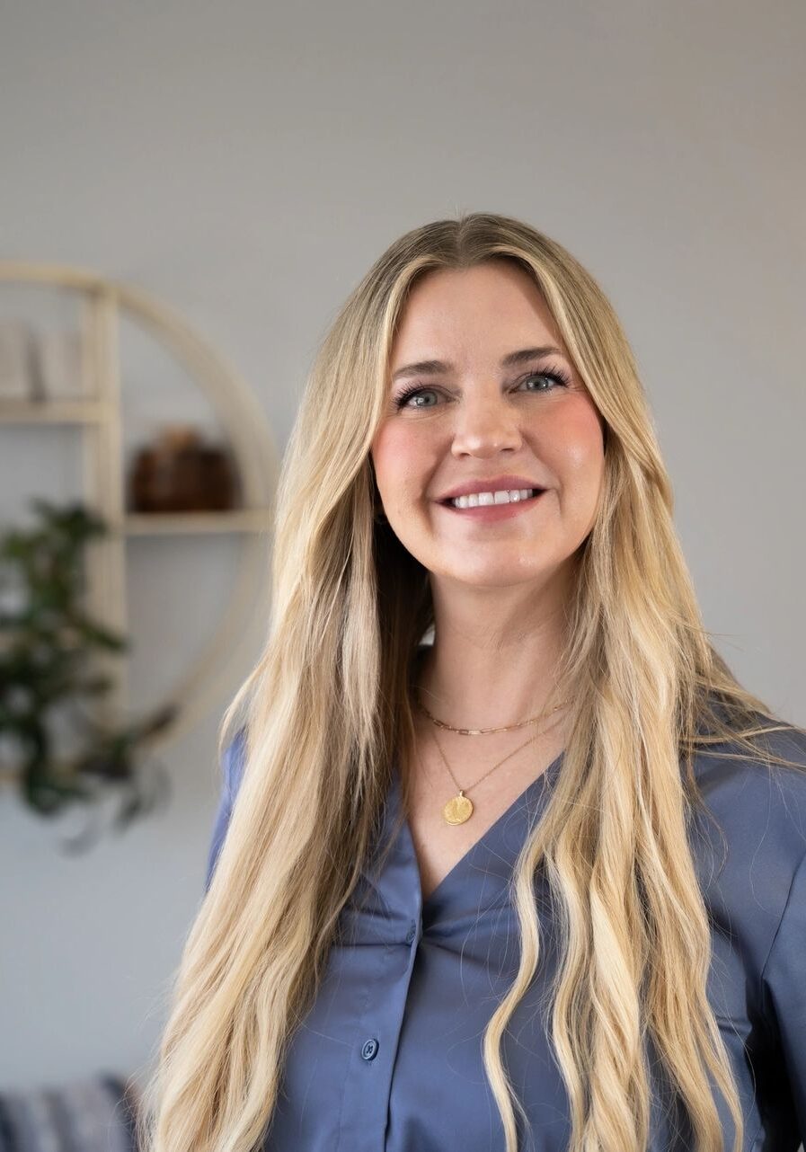 Happy woman standing in bright room